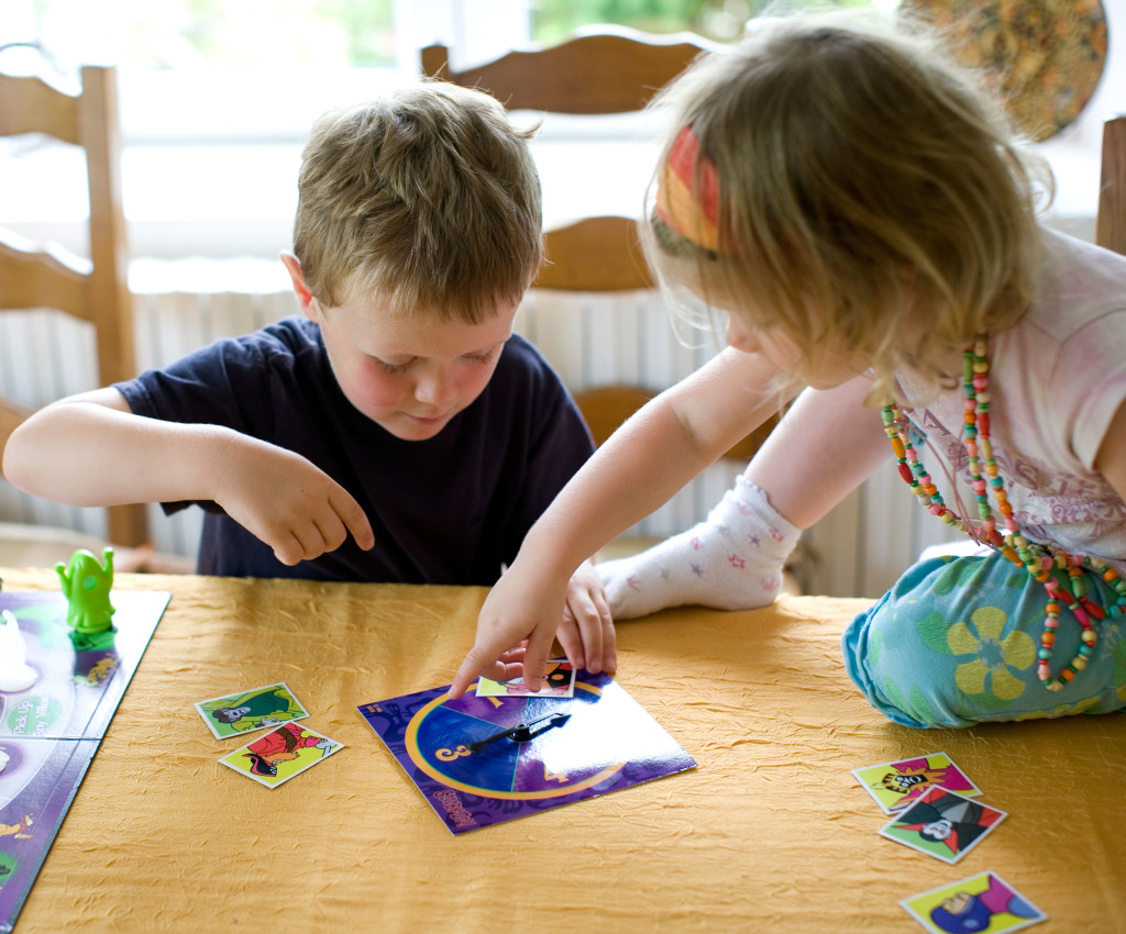 Children playing a board game